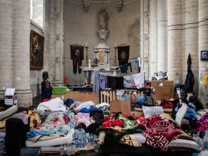 BRUSSELS, BELGIUM - JULY 14: For more than fifty days, hundreds of undocumented migrants have been on hunger strike at St John the Baptist Church at the Beguinage / House of Compassion on July 14, 2021 in Brussels, Belgium. The migrants, who said they have lived and worked in Belgium …