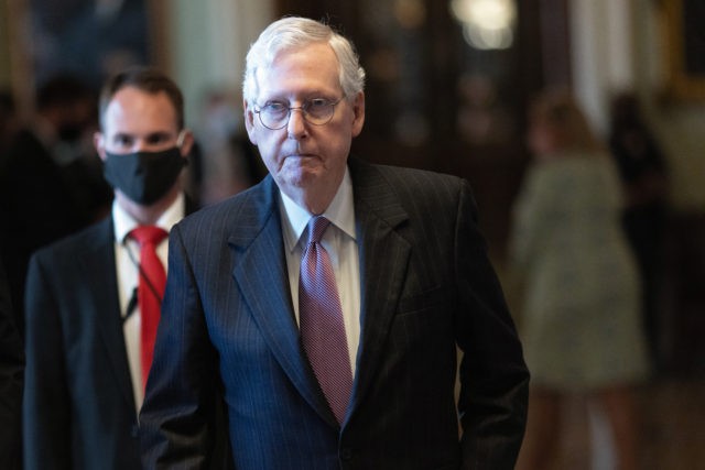 WASHINGTON, DC - SEPTEMBER 30: Senate Minority Leader Mitch McConnell walks from the U.S. Senate chamber to his office at the U.S. Capitol on September 30, 2021 in Washington, DC. The Senate is expected to pass a short term spending bill to avoid a government shutdown. (Photo by Win McNamee/Getty …