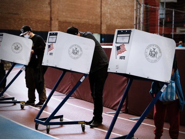 NEW YORK, NEW YORK - OCTOBER 25: People visit an early voting site at a YMCA in Brooklyn on October 25, 2021 in New York City. Over 30,000 New Yorkers have already cast their ballots in a series of races in New York City including for the election of the …