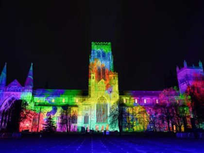 DURHAM, ENGLAND - NOVEMBER 17: A light artwork called In Our Hearts Blind Hope is projected onto the facade of Durham Cathedral and forms part of the Durham Lumiere light festival on November 17, 2021 in Durham, England. The Lumiere light festival is the UK's largest light festival and comes …