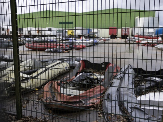 DOVER, ENGLAND - NOVEMBER 26: Inflatable craft, used by migrants to cross the channel, are stored at a facility on November 26, 2021 in Dover, England. UK Prime Minister Boris Johnson last night tweeted a letter he addressed to President Macron setting out steps that he believes would help prevent …