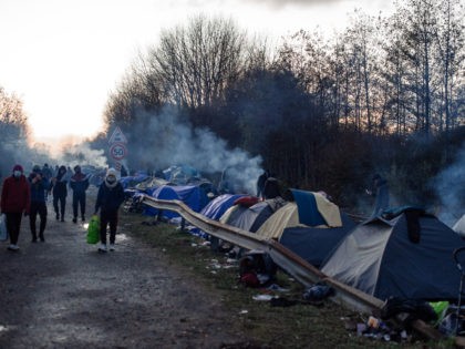 CALAIS, FRANCE - NOVEMBER 29: The camp of Grande-Synthe near Calais on November 29, 2021 in Calais, France. As winter closes in, migrants are determined to make the crossing to reach the UK. The number of attempted crossings has tripled in 2021 compared to 2020 after authorities blocked other transportation …
