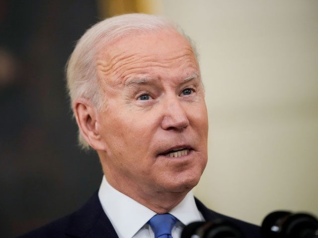 WASHINGTON, DC - DECEMBER 21: U.S. President Joe Biden speaks about the omicron variant of the coronavirus in the State Dining Room of the White House December 21, 2021 in Washington, DC. As the omicron variant fuels a new wave of COVID-19 infections, Biden announced plans that will expand testing …