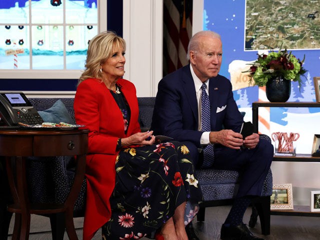 WASHINGTON, DC - DECEMBER 24: U.S. President Joe Biden and first lady Dr. Jill Biden participate in an event to call NORAD and track the path of Santa Claus on Christmas Eve in the South Court Auditorium of the Eisenhower Executive Building on December 24, 2021 in Washington, DC. The …