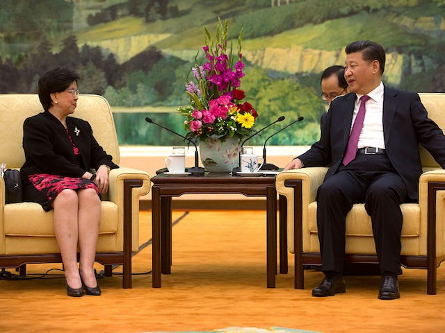 BEIJING, CHINA - JULY 25: World Health Organization Director-General Margaret Chan, (L) and Chinese President Xi Jinping, right, speak during a meeting at the Great Hall of the People on July 25, 2016 in Beijing, China. (Mark Schiefelbein-Pool/Getty Images)