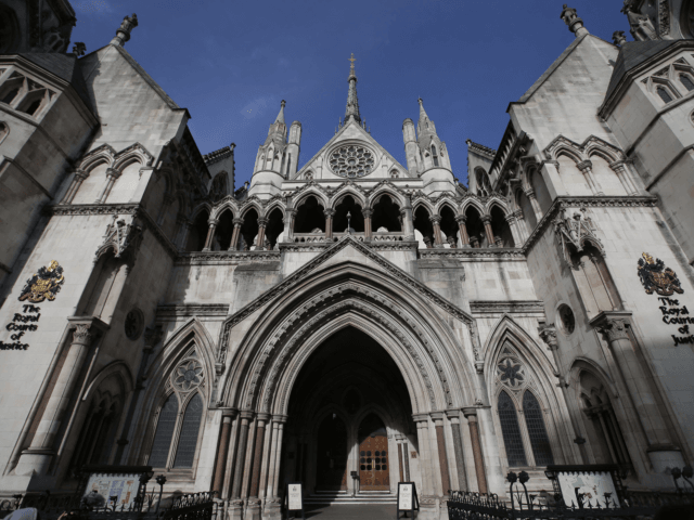 The Royal Courts of Justice building, which houses the High Court of England and Wales, is pictured in London on February 3, 2017. (Photo by Daniel LEAL / AFP) (Photo by DANIEL LEAL/AFP via Getty Images)