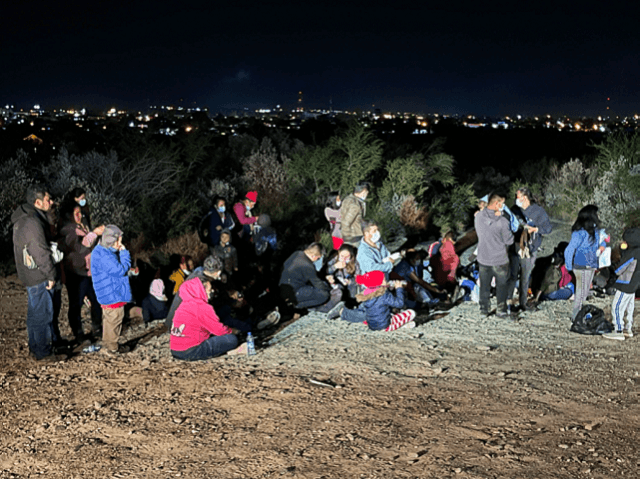Human smugglers move migrants across the Rio Grande on Christmas Eve. (Randy Clark/Breitba