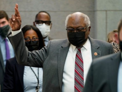 House Majority Whip James Clyburn (D-SC) crosses his fingers as he walks to a Democratic House caucus meeting on Capitol Hill on November 3, 2021 in Washington, DC. Democrats continue to negotiate within the party on the Biden administration's social policy, infrastructure and climate change agenda. (Photo by Joshua Roberts/Getty …