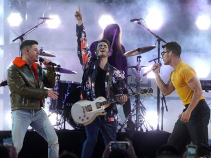 Nick Jonas, from left, Kevin Jonas and Joe Jonas, of the Jonas Brothers, perform at the Bi