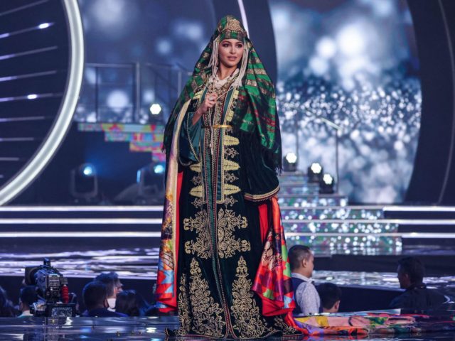Miss Morocco, Kawtar Benhalima, appears on stage during the national costume presentation