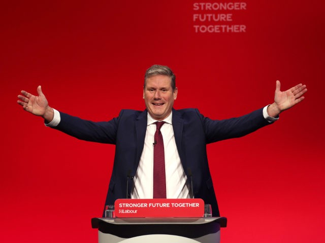 BRIGHTON, ENGLAND - SEPTEMBER 29: Sir Keir Starmer makes his keynote speech to Labour Conference for the first time as party leader on September 29, 2021 in Brighton, England. This is Keir Starmer's first in-person conference as Labour leader, a role he assumed in April 2020 after the party's resounding …