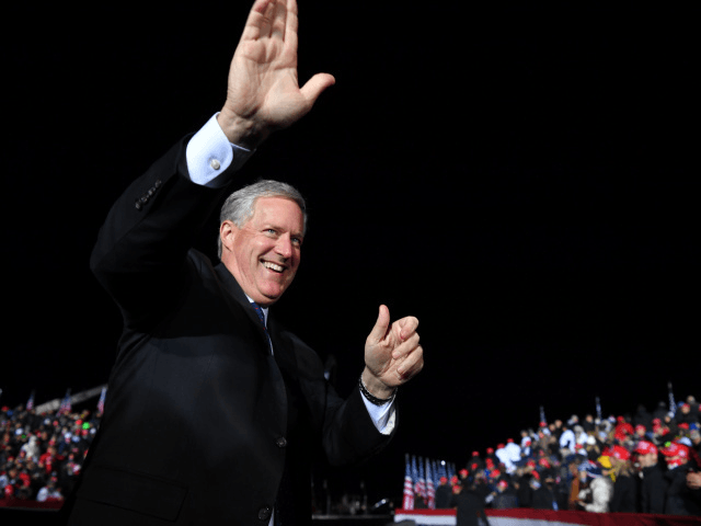 White House Chief of Staff Mark Meadows waves as he arrives for a US President Donald Trump campaign rally at Waukesha County Airport in Waukesha, Wisconsin on October 24, 2020. (Photo by MANDEL NGAN / AFP) (Photo by MANDEL NGAN/AFP via Getty Images)