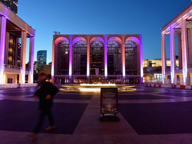 A person walks past the closed Metropolitan Opera at Lincoln Center on January 7, 2021 in