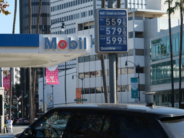 The high price of gasoline is displayed at a Los Angeles gas station on November 24, 2021.