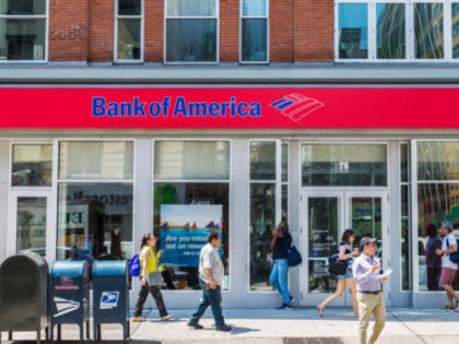 Facade of a bank branch of Bank of America on the street with people around in New York City, USA (Stock photo via Getty)