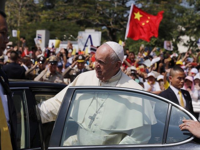 Pope Francis leaves Saint Peter's Parish, a Catholic community outside Bangkok, as a Chine