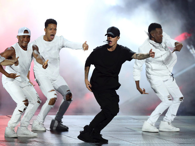 FILE - Justin Bieber performs at the MTV Video Music Awards in Los Angeles on Aug. 30, 2015. The fiance of slain Saudi critic Jamal Khashoggi joined a chorus of voices on Sunday, Nov. 21, 2021, calling on pop star Justin Bieber to cancel his concert in Saudi Arabia next …