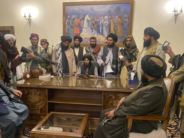 Taliban fighters take control of Afghan presidential palace in Kabul, Afghanistan, Aug. 15, 2021, after President Ashraf Ghani fled the country.