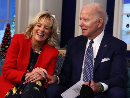 WASHINGTON, DC - DECEMBER 24: U.S. President Joe Biden and first lady Dr. Jill Biden participate in an event to call NORAD and track the path of Santa Claus on Christmas Eve in the South Court Auditorium of the Eisenhower Executive Building on December 24, 2021, in Washington, DC. The …
