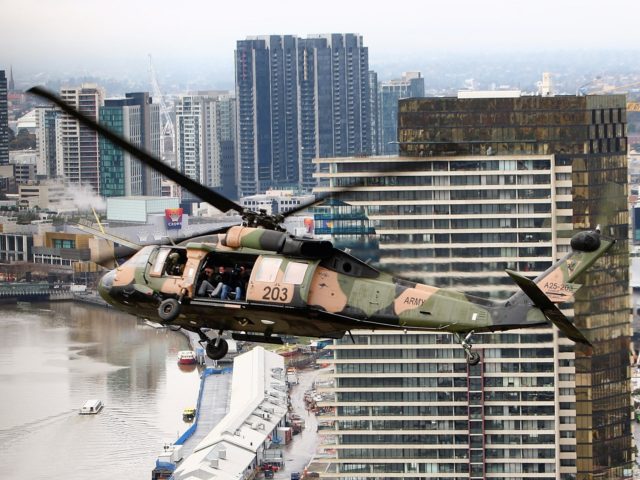 MELBOURNE, AUSTRALIA - JULY 20: An Army Sikorsky S-70A-9 Black Hawk helicopter flies above