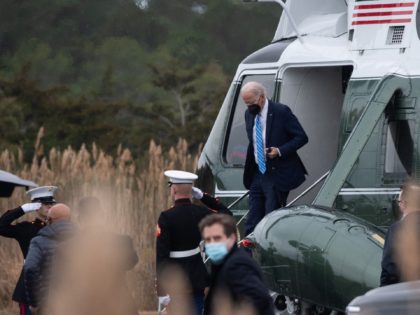 US President Joe Biden steps out of Marine One helicopter upon arrival in Rehoboth Beach, Delaware, December 27, 2021. (Photo by SAUL LOEB / AFP) (Photo by SAUL LOEB/AFP via Getty Images)