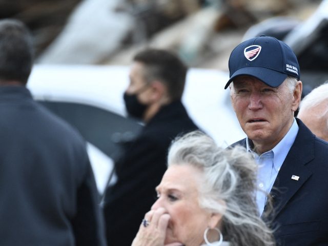 US President Joe Biden tours storm damage in Mayfield, Kentucky, on December 15, 2021. - Biden will tour areas devastated by the December 10-11 tornadoes. (Photo by BRENDAN SMIALOWSKI/AFP via Getty Images)