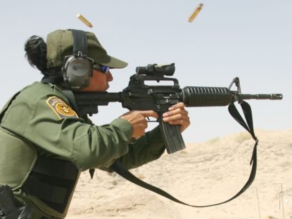 U.S. Border Patrol Agent Blanca Parra demonstrates her marksmanship with an M-4 carbine Th