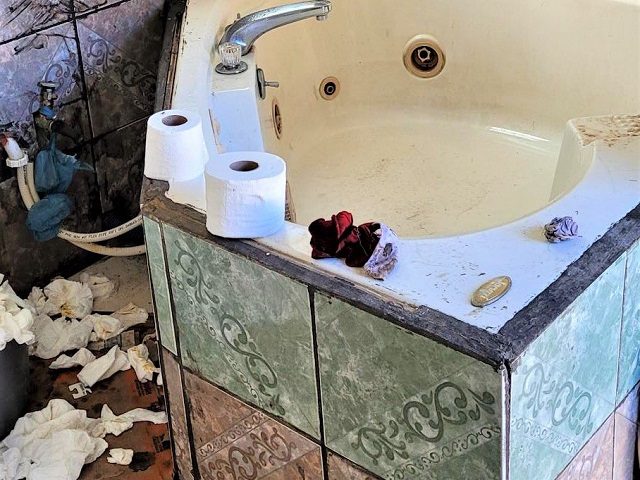 A filthy bathroom found in a human smuggling stash house near the Texas border with Mexico. (U.S. Border Patrol/Laredo Sector)
