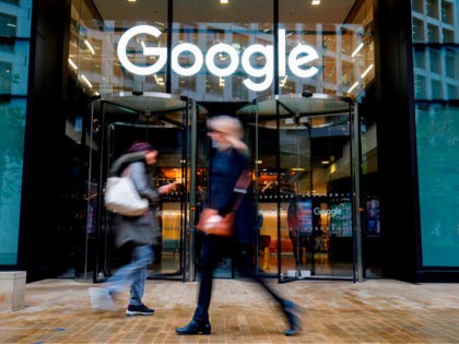 People walk past Google's UK headquarters in London on November 1, 2018. - Hundreds of employees walked out of Google's European headquarters in Dublin on Thursday as part of a global campaign over the US tech giant's handling of sexual harassment that saw similar protests in London and Singapore. (Photo …