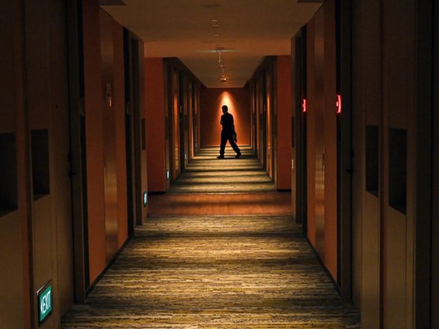 A housekeeper walks along the corridor of guests rooms at the Connect@Changi, billed as th