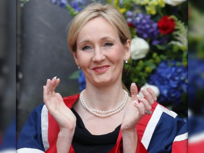 Harry Potter author J.K. Rowling applauds after receiving a Benefactor's Award from Britain's Princess Anne at an open air ceremony at the University of Edinburgh, Scotland, on September 26, 2011. The honour is in recognition of a £10 million donation made by Rowling to the university last year to establish …