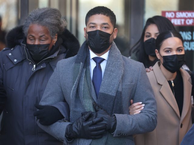 CHICAGO, ILLINOIS - DECEMBER 08: Former "Empire" actor Jussie Smollett leaves the Leighton Criminal Courts Building as the jury begins deliberation during his trial on December 8, 2021 in Chicago, Illinois. Smollett is accused of lying to police when he reported that two masked men physically attacked him, yelling racist …