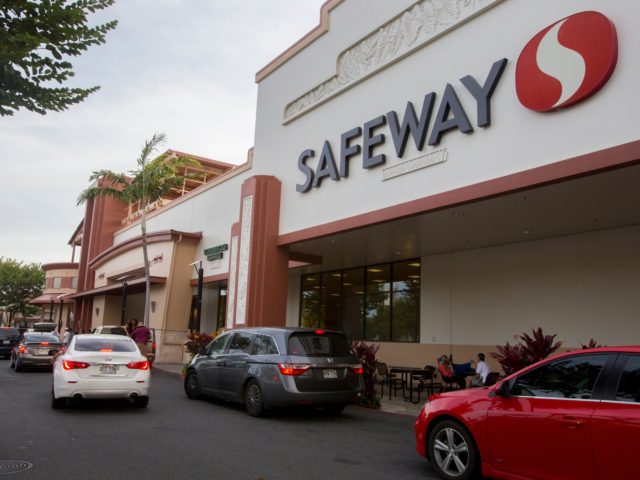 HONOLULU, HI - AUGUST 22: The parking lot of Safeway on Kapahulu has lines of cars just wa