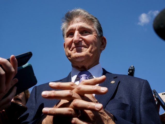 Sen. Joe Manchin, D-W.Va., a centrist Democrat vital to the fate of President Joe Biden's $3.5 government overhaul, updates reporters about his position on the bill, at the Capitol in Washington, Thursday, Sept. 30, 2021. Despite months of being courted and cajoled, Sen. Joe Manchin is still not a yes …