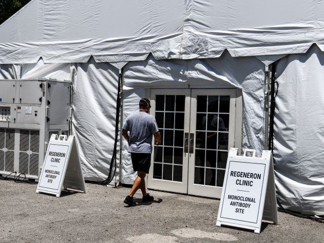 A man enters the Regeneron Clinic at a monoclonal antibody treatment site in Pembroke Pine