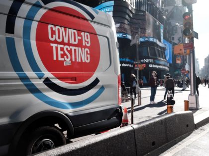 NEW YORK CITY - DECEMBER 20: A Covid-19 testing van sits in Times Square on December 20, 2021 in New York City. New York City, which was initially overwhelmed by the Covid pandemic, has once again seen case numbers surge as the new omicron variant becomes dominant. Positivity rates in …