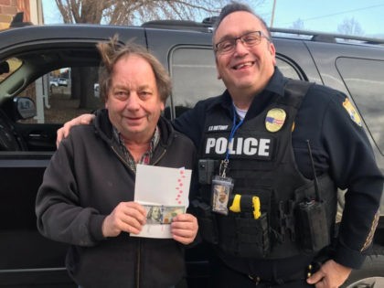 Officers with the Fremont Police Department in Nebraska handed out $100 bills to drivers during routine traffic stops Tuesday on behalf of an anonymous donor.