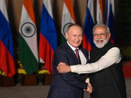 India's Prime Minister Narendra Modi (R) greets Russian President Vladimir Putin before a meeting at Hyderabad House in New Delhi on December 6, 2021. (Photo by Money SHARMA / AFP) (Photo by MONEY SHARMA/AFP via Getty Images)