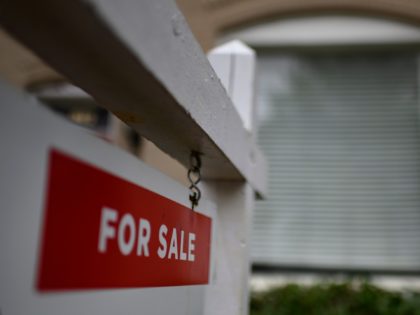 A sign "For Sale" is displayed in front of a renovated individual House in Washington on April 24, 2020. - Sales of new single?family houses collapsed in March as the lockdowns to contain the coronavirus outbreak took effect, dropping 15.4 percent compared to February, according to government data released on …