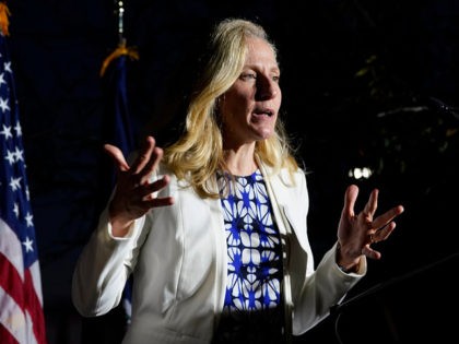 Rep. Abigail Spanberger, D-Va., gestures during a rally for Democratic gubernatorial candidate Terry McAuliffe in Richmond, Va., Friday, Oct. 15, 2021. McAuliffe will face Republican Glenn Youngkin in the November election. (AP Photo/Steve Helber)