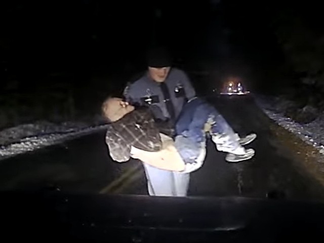 WATCH: Trooper Rescues Man with Alzheimer's from Ditch in Storm - Vimarsana News