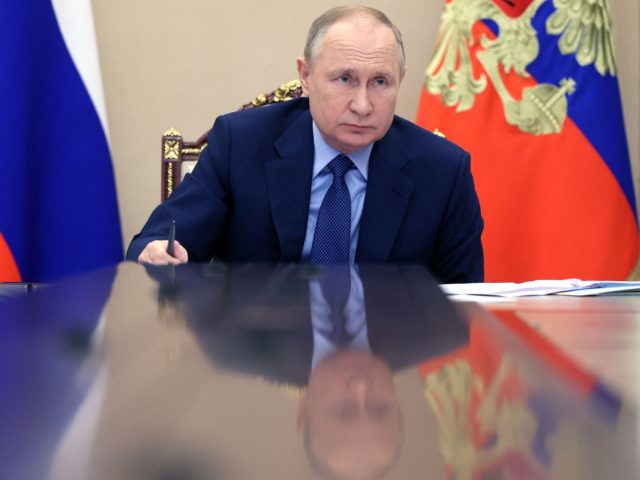 Russian President Vladimir Putin chairs a meeting via teleconference on the situation of coal mining enterprises in Kuzbass, at the Kremlin in Moscow, on DEcember 2, 2021. (Photo by Mikhail Metzel / SPUTNIK / AFP) (Photo by MIKHAIL METZEL/SPUTNIK/AFP via Getty Images)
