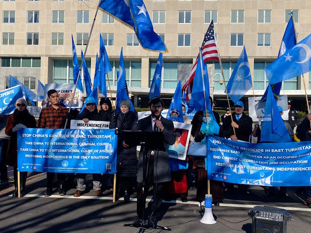 Uyghurs and supporters protest in front of the State Department, December 21, 2021.