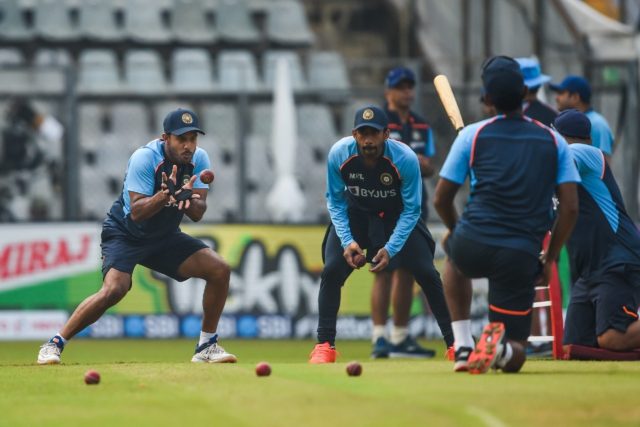India's cricketers warm up before the start of the first day of the second Test