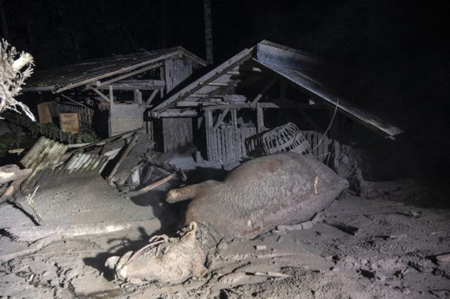 The eruption left at least 11 villages coated in volcanic ash, submerging houses and smoth