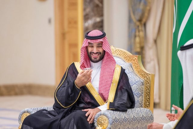 Saudi Crown Prince Mohammed bin Salman drinks coffee with his Emirati host as he presses o