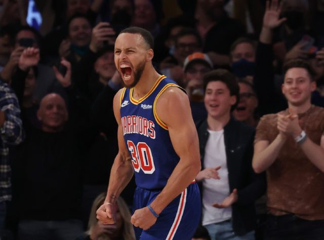 Stephen Curry celebrates after breaking Ray Allen’s all-time three-pointer record at Mad