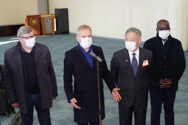 French lawmaker Francois de Rugy (2nd L) speaks to the press after arriving at Taiwan's Ta