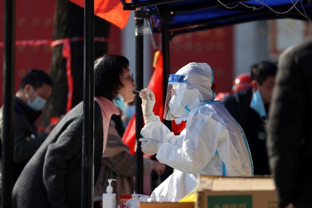 China is on high alert as it fights local Covid-19 outbreaks in several cities