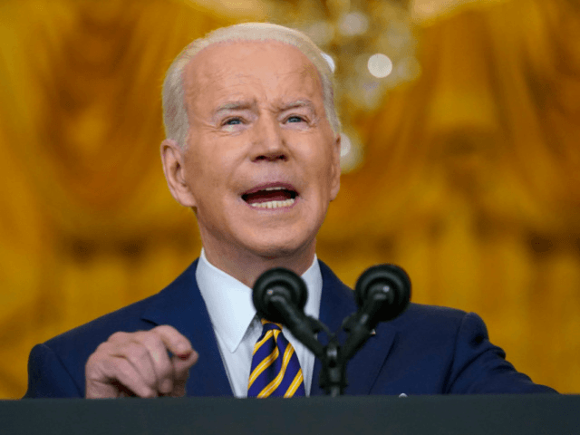 President Joe Biden speaks during a news conference in the East Room of the White House in